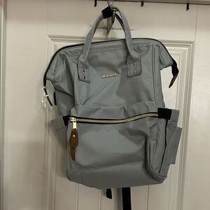 Lovevook travel green back pack with gold accents